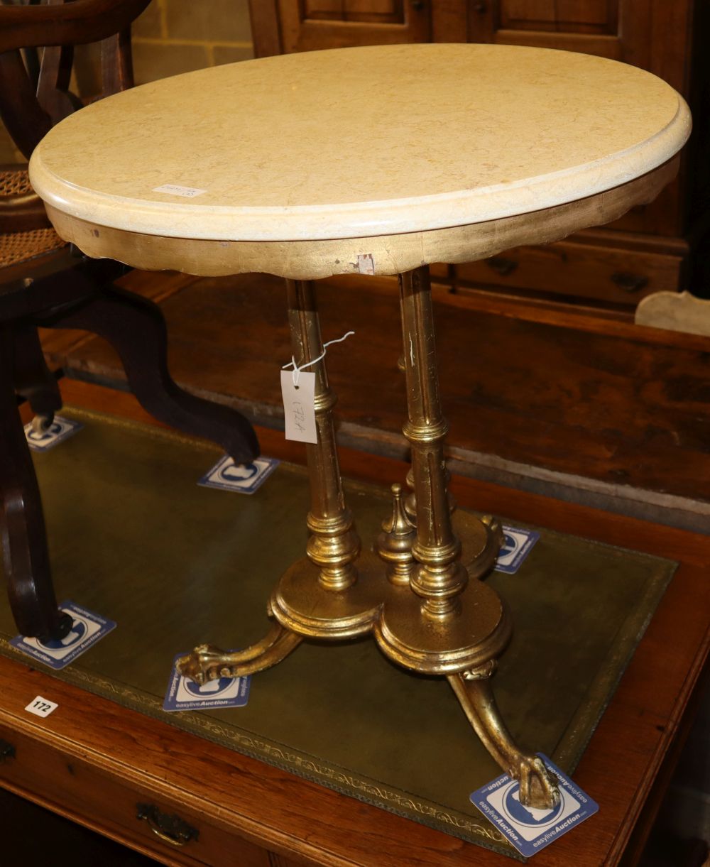 A circular giltwood marble top occasional table and a painted standard lamp, table 55cm diameter, H.64cm